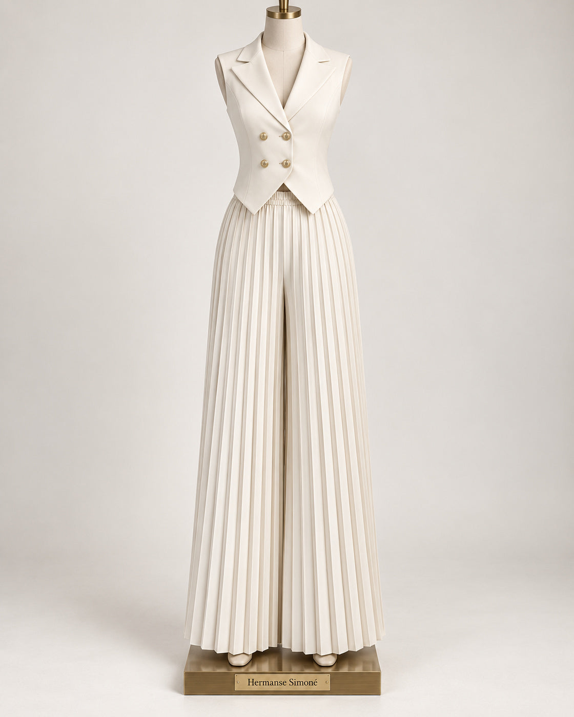Aurelia Pleated Pants Set in Ivory — front view on a branded display form