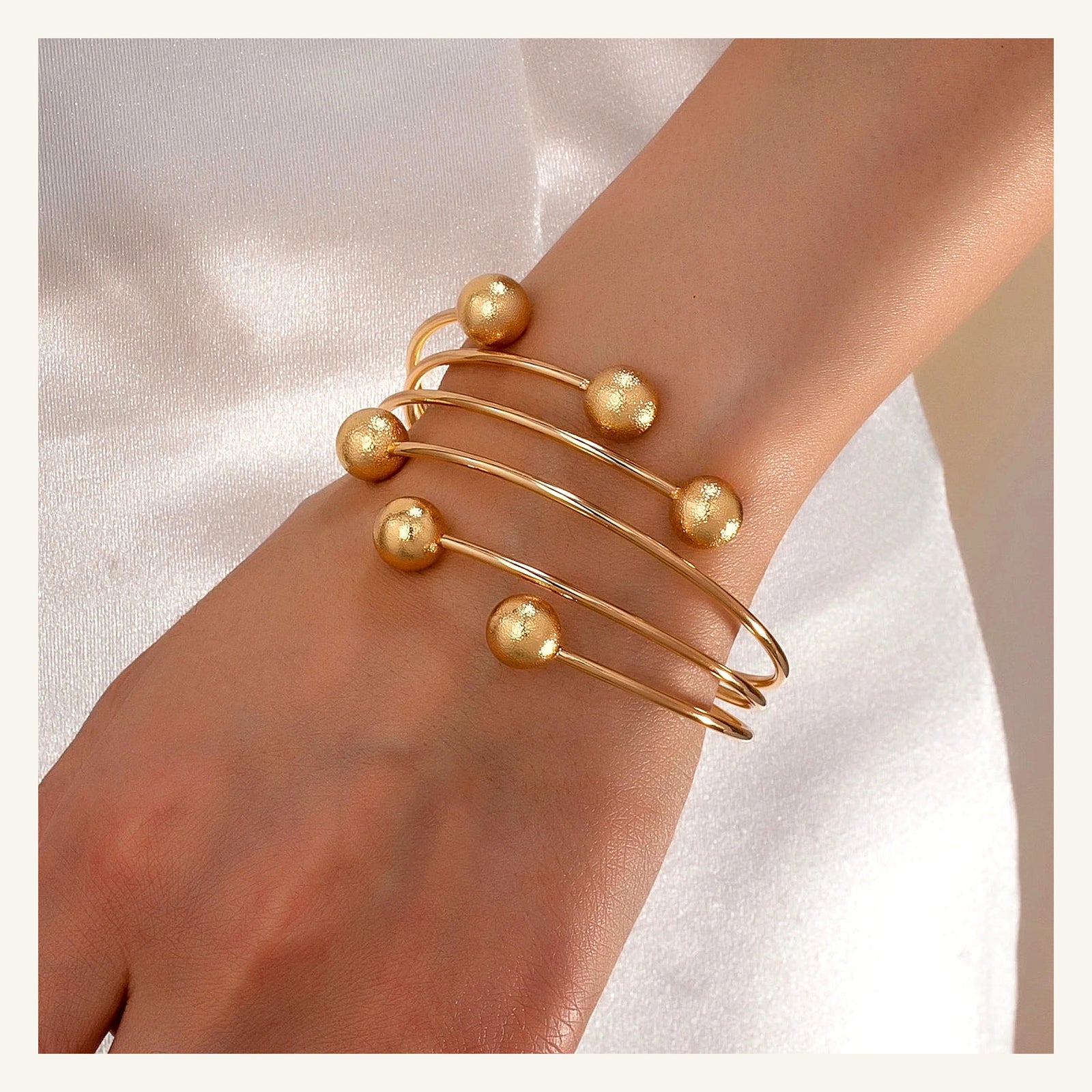 Vellara Orbit Bracelet — Gold lifestyle view