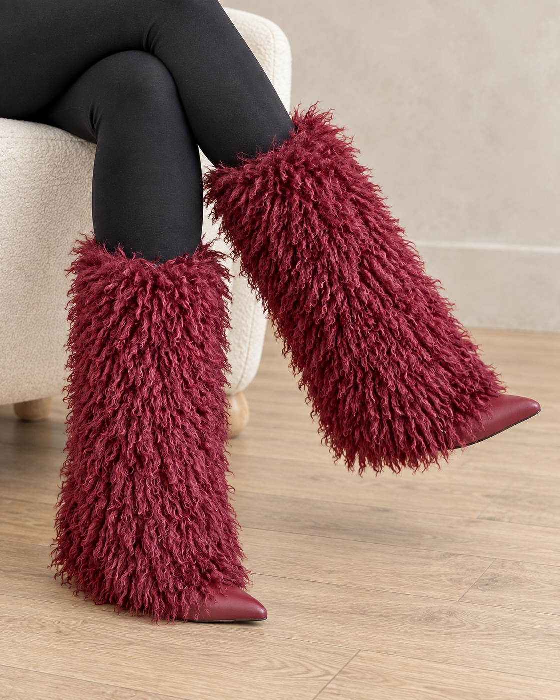 Borelle Shag Boots in Wine — crossed raised on foot