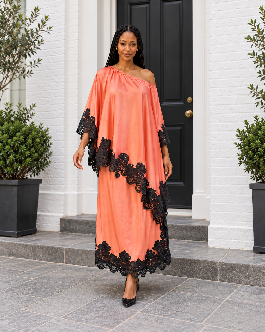 Celandra Lace Cape Dress — Coral Pink — Model 1 — front view