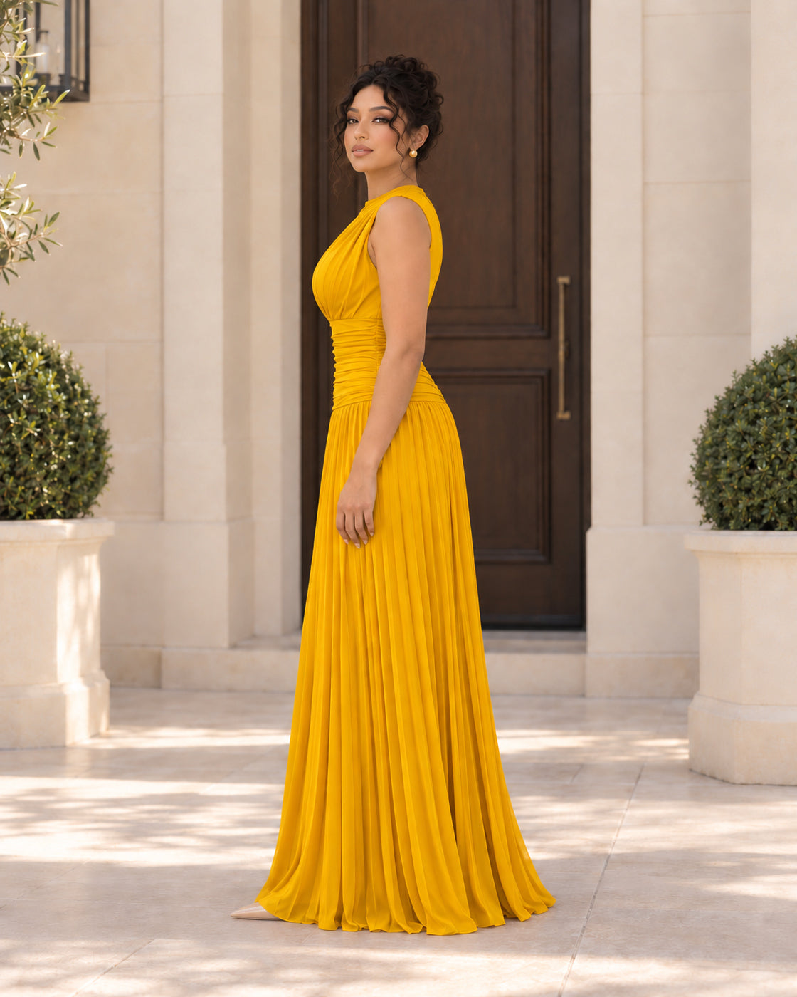 Lisara Pleated Maxi Dress in Golden — Model 9, side view