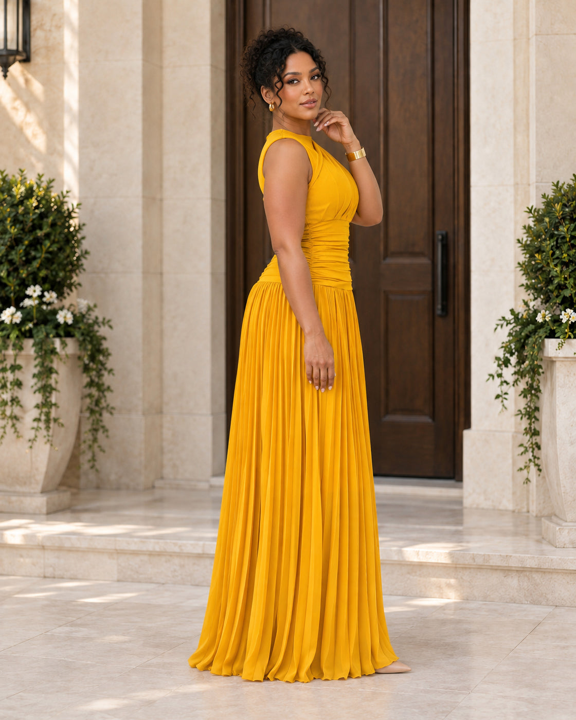 Lisara Pleated Maxi Dress in Golden — Model 11, side view