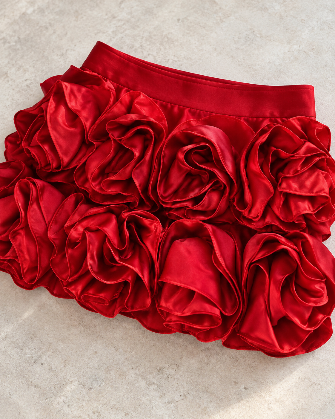 Ravelle Rosette Skirt Set in Red — dimensional rosette mini skirt close-up