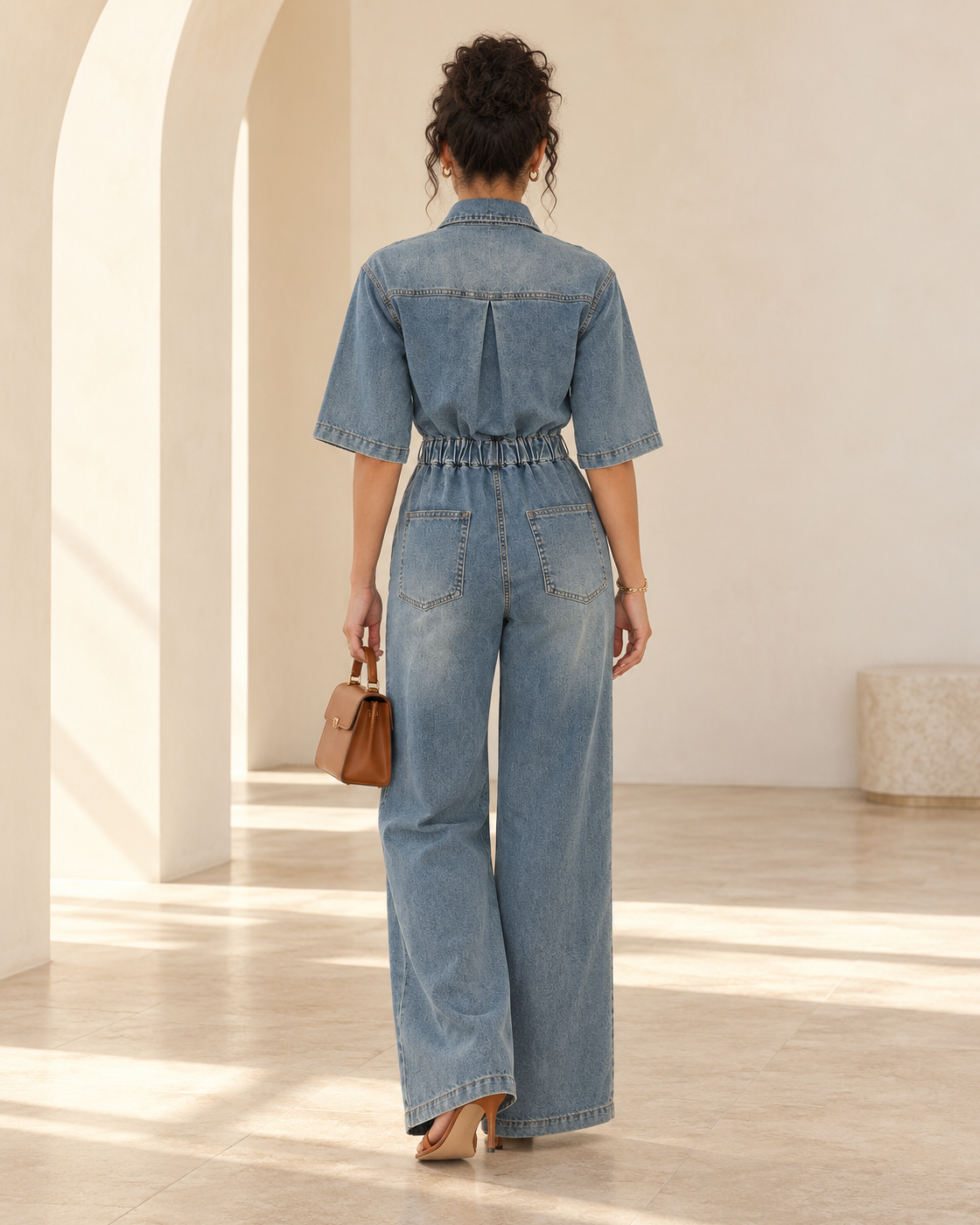 Rovina Denim Jumpsuit — Washed Blue — Model 9 — back view