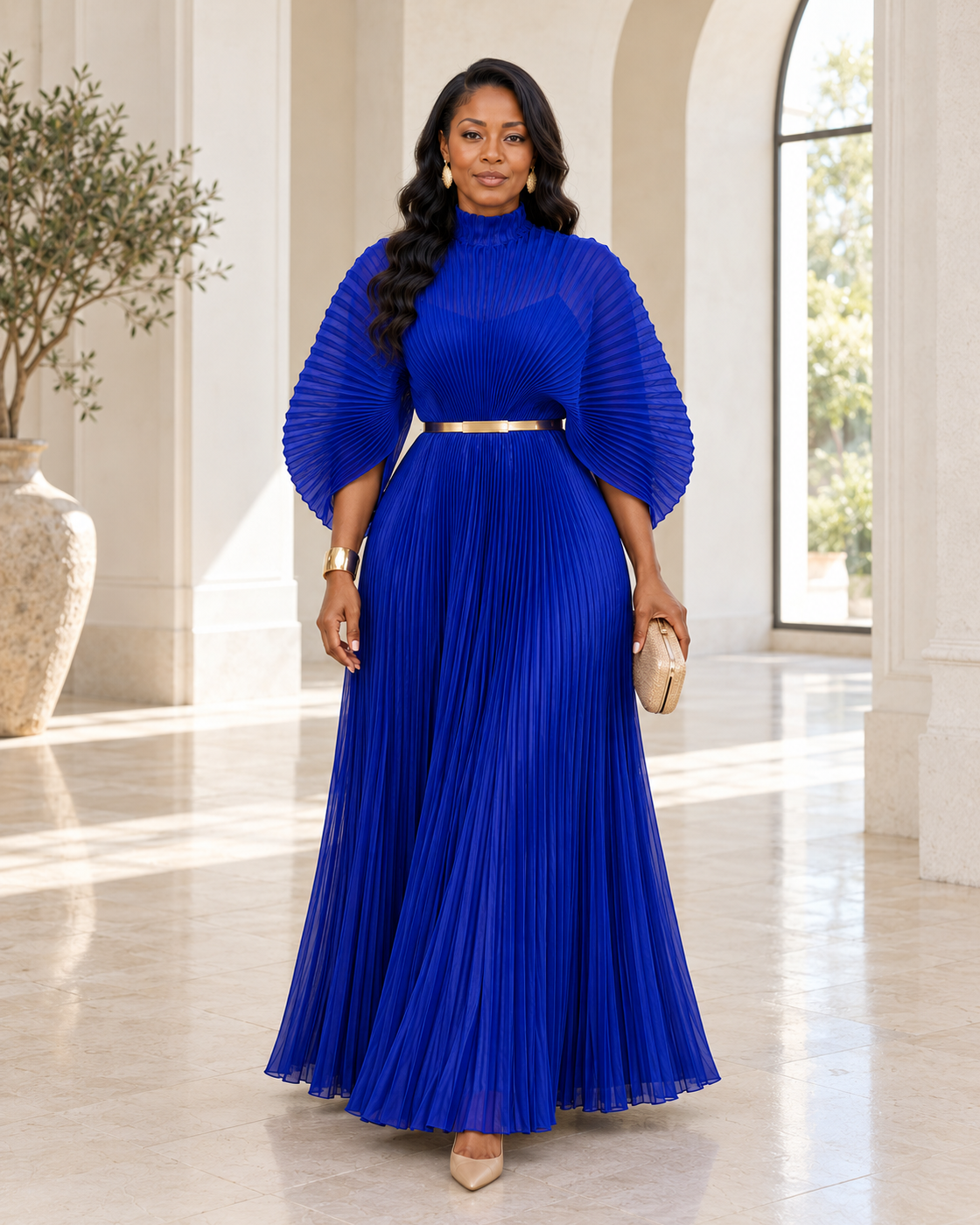 Serapha Pleated Maxi Dress in Blue — front view; styling belt not included