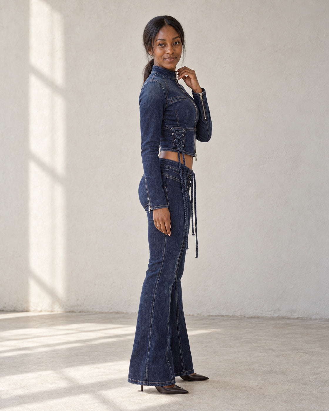 Sevra Lace-Up Denim Top and Jeans in Blue Denim, styled together and sold separately — Model 6, side view