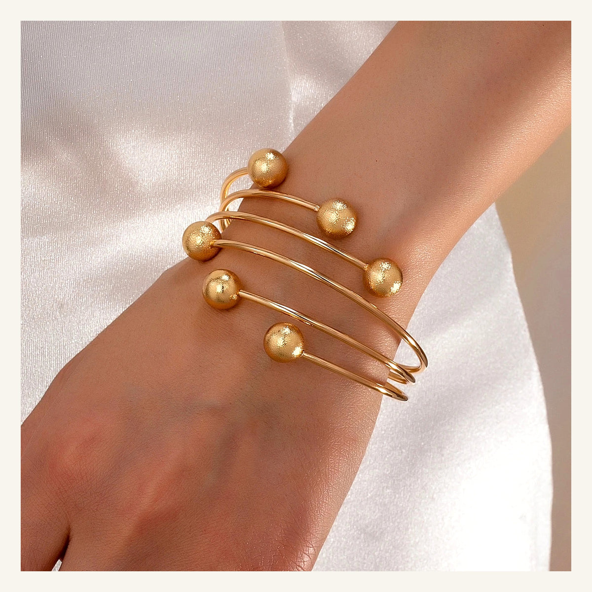Vellara Orbit Bracelet — Gold lifestyle view