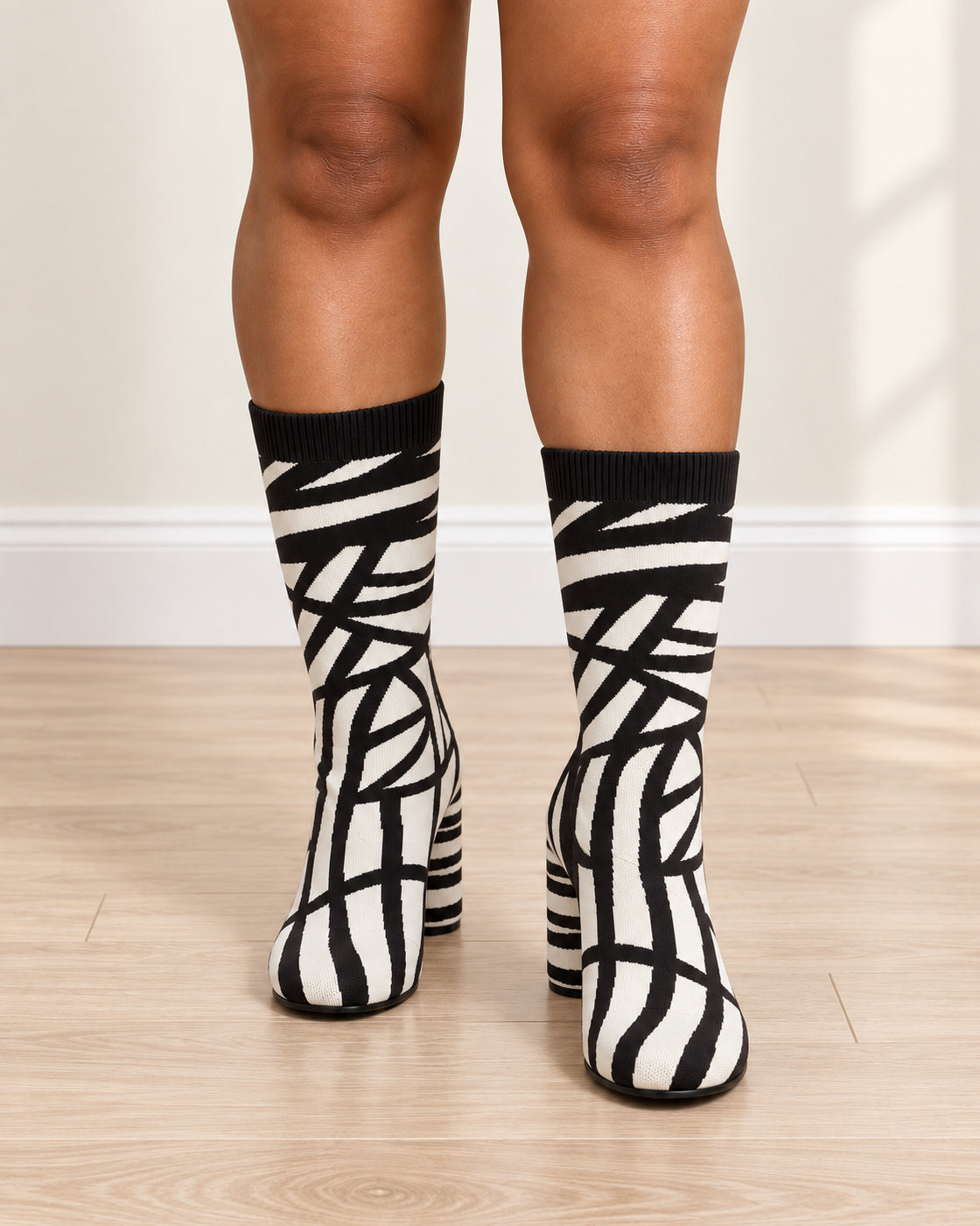 Viretta Knit Boots in Black — front on foot